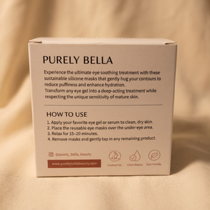 The back of a PURELY BELLA skincare box, showing product instructions and branding on a beige fabric background.