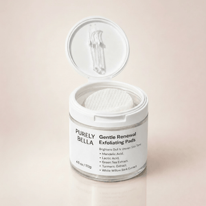 Jar of Purely Bella Gentle Renewal Exfoliating Pads on a beige background