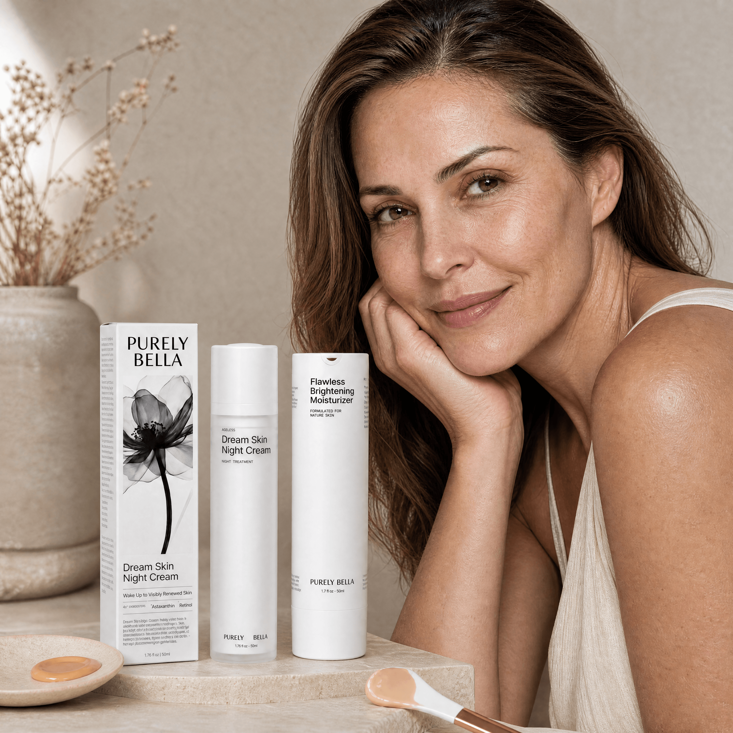 Woman leaning on a surface with Purely Bella skincare products in the foreground.