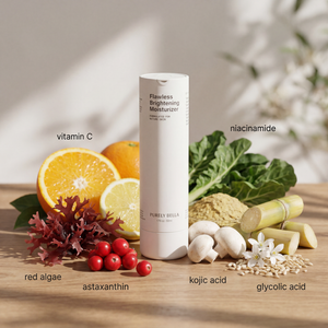 Flawless Brightening Moisturizer bottle with ingredients like vitamin C, niacinamide, and red algae on a wooden surface.