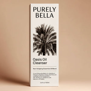 Box of Purely Bella Oasis Oil Cleanser with palm tree image on a gray background