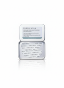Purely Bella reusable silicone eye mask reflected on a white surface