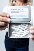 Woman holding reusable eye pads - spa-like eye treatment amplifies serums at home