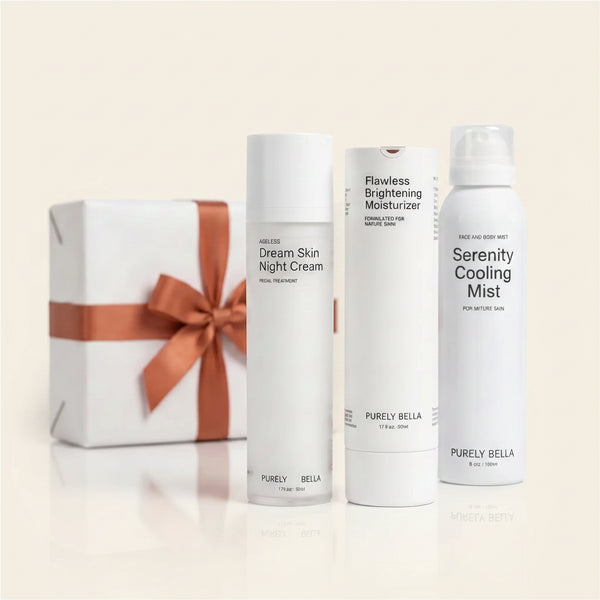 Three skincare products from Purely Bella with a gift box on a white background