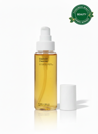 Bottle of Oasis Oil Cleanser with a white cap on a white background, featuring an 'Evergreen Beauty' award badge. Best Oil cleanser